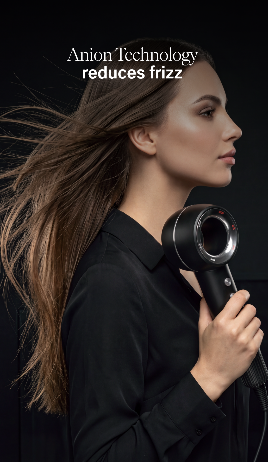 Woman drying her hair with the niwa theO